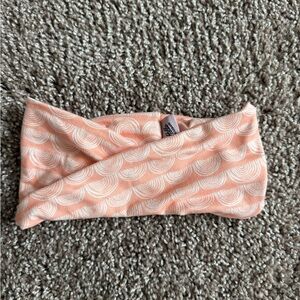Peach and White Hairband. Criss cross style. Non-smoking home. Great condition